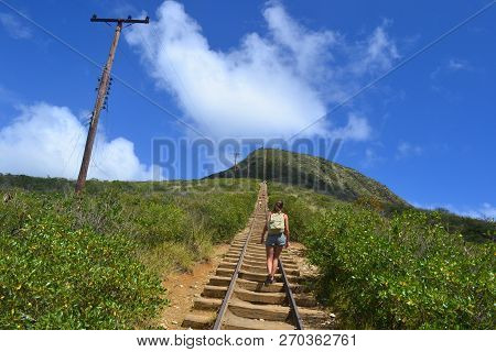 A Woman Hiking Up The Hill In Kokohead, Oahu, Hawaii