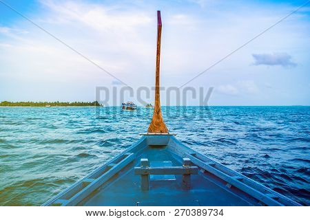 View From Traditional Wooden Boat Dhoni To Landscape Of Beautiful Sunset In Maldives Island