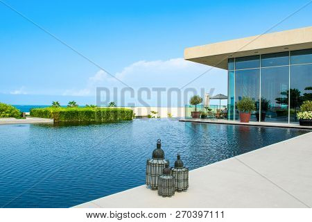 Ajman, United Arab Emirates - 30 October 2018: Landscape With Modern Design Buildings, Lagoon Pool A