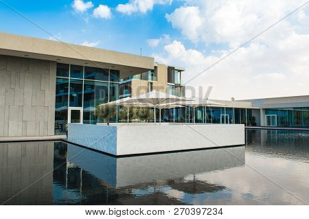 Ajman, United Arab Emirates - 30 October 2018: Landscape With Modern Design Buildings, Lagoon Pool A