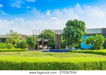 Ajman, United Arab Emirates - 30 October 2018: Landscape With Modern Design Villas And Garden In A L