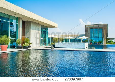 Ajman, United Arab Emirates - 30 October 2018: Landscape With Modern Design Buildings, Lagoon Pool A