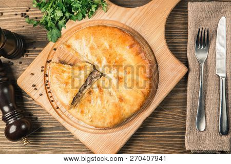 Round Meat Pie. Traditional Dish Of The Cuisine Of The Caucasus