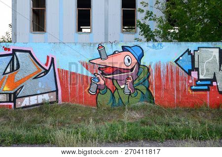 Full And Acomplished Graffiti Artwork. The Old Wall Decorated With Paint Stains In The Style Of Stre