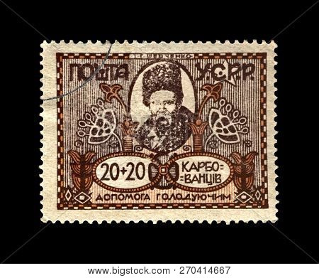 USSR - CIRCA 1923: stamp printed in Ukrainian Soviet Socialist Republic shows famous ukrainian poet Taras Shevchenko, famine help, circa 1923. vintage postal stamp isolated on black background.