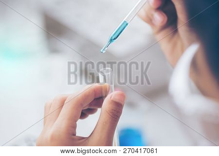 Young Asian Scientist Are Certain Activities On Experimental Science Like Mixing Chemicals Or Entry 