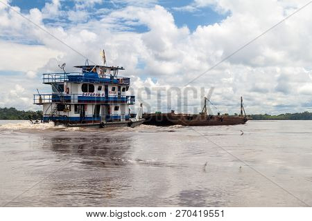Napo, Ecuador - July 7, 2015 Cargo Boat On River Napo