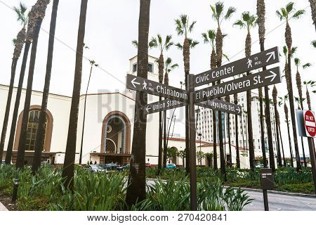 Street Signs And In The Background Is Union Station Located In Los Angeles - Usa