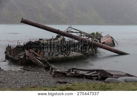 Old Ship Wreck On A Rainy Day In Grytvyken, The Capitol Of The Island Of South Georgia.