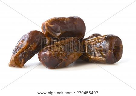 Dried Halawi Dates On A White