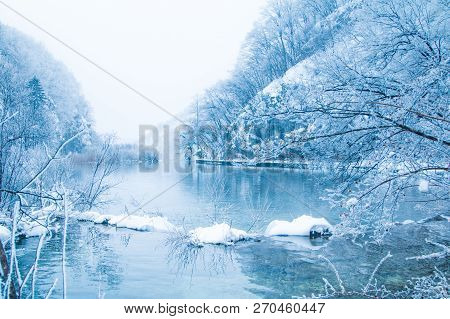 Croatia, Plitivice, Winter Landscape, Frozen Waterfalls And Lakes In Popular Nature Park Plitvicka J