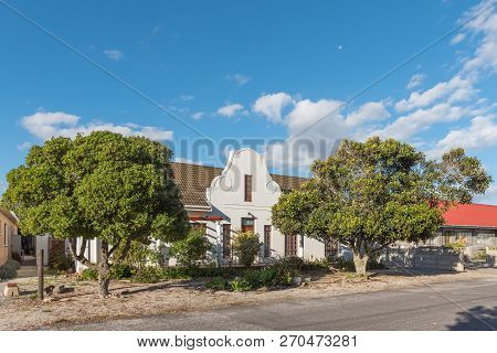Dwarskersbos, South Africa, August 21, 2018: A Street Scene, With A Building In Cape Dutch Architect