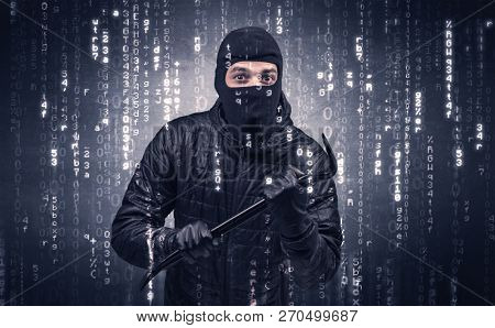 Burglar in action with encoded concept and his tools in his hand. 