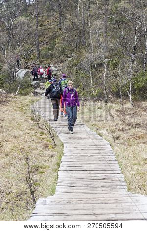 Preikestolhytta , Norway - May 13, 2017: Tourists On Trail To Preikestolen On May 13, 2017 In Preike