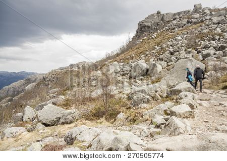 Preikestolhytta , Norway - May 13, 2017: Tourists On Trail To Preikestolen On May 13, 2017 In Preike