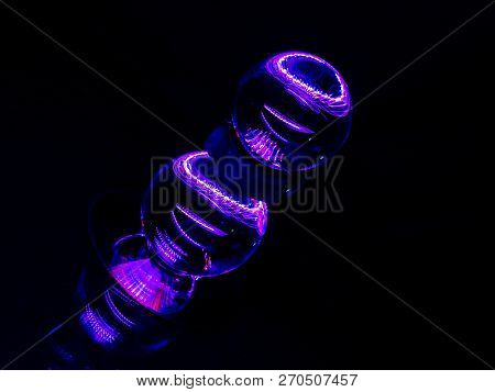 With The Lensballs Stacked The Image Resembles An Abstract Shish Kabob.