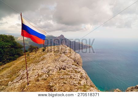 The Flag On Top Of Mount Kush-kaya Crimea. Russia.