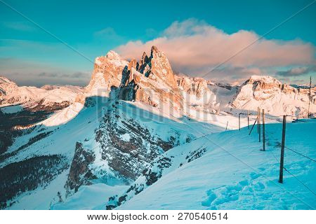 Classic View Of Famous Seceda Mountain Peaks In The Dolomites Illuminated In Beautiful Evening Light