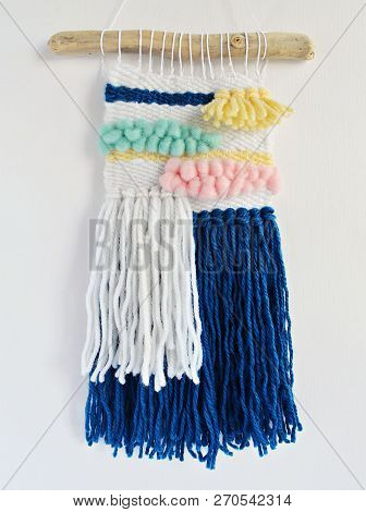 Weaving Colorful Handmade Wall Hanging Over White