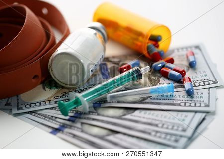 Money Dollars Used Syringe Pills And Unknown Powder Drug Trafficking Making Background. Law For The 