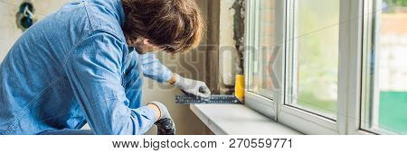 Man In A Blue Shirt Does Window Installation Banner, Long Format