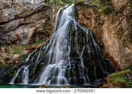 Beautiful View Of Famous Gollinger Wasserfall With Mossy Rocks And Green Trees, Golling, Salzburger 