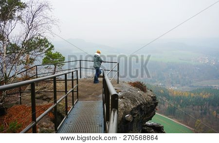 View From A Rock To Mountains And Town