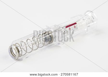 Transparent Syringe With Eralfon On A White Background.