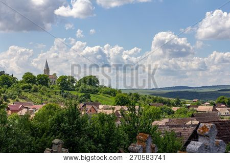 Evangelical Luthern Church On A Hill Above The Romanian Village Of Blajel