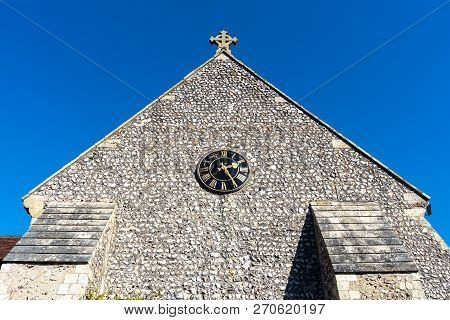 St Margaret's Church, Graveyard And Cross Sign In The Village Of Rottingdean, East Sussex, England, 