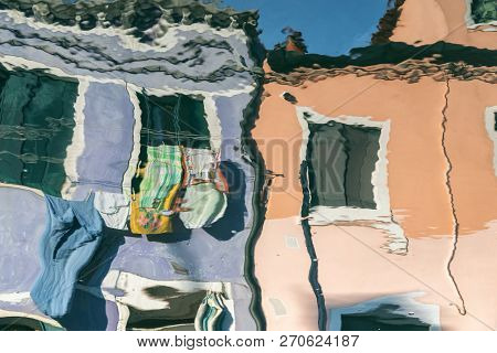 Reflection Of Colourful Houses On The Island Of Burano