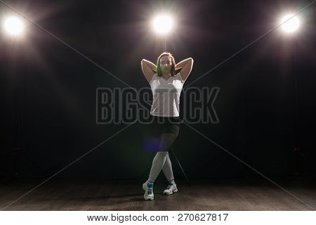 Hip-hop, Jazz-funk, Tecktonik, Waacking, Trance And Street Dances Concept - Young Woman Dancing Jazz