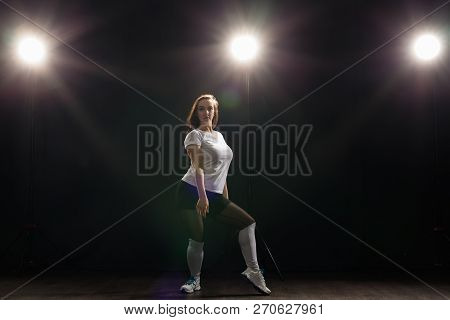 Hip-hop, Jazz-funk, Tecktonik, Waacking, Trance And Street Dances Concept - Young Woman Dancing Jazz