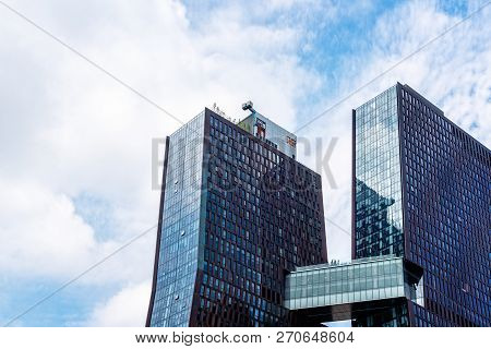 New York City, Usa - June 24, 2018: Low Angle View Of Modern Apartment Buildings With Skybridge Desi