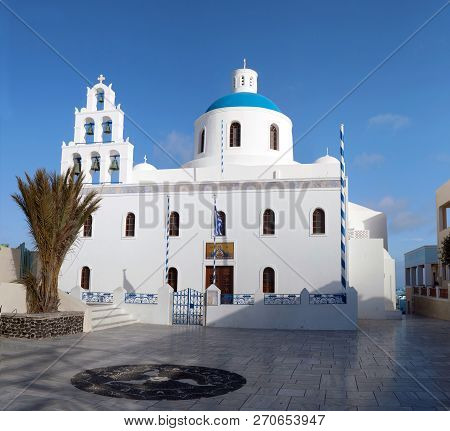 Oia, Greece - March 6, 2018: Church Of Panagia Of Platsani In Oia Town, Santorini Island, Cyclades, 
