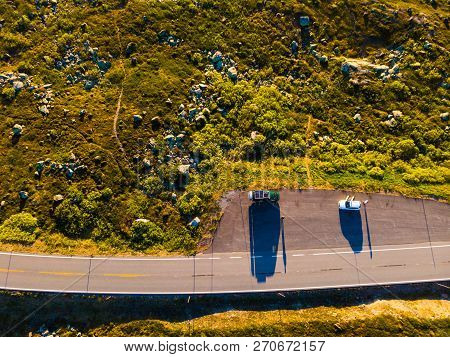 Top Down View. Camper Car On Road, Hardangervidda Mountain Plateau, Norway Landscape. National Touri