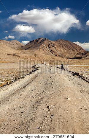 Pamir Highway Or Pamirskij Trakt With Biker, There Is One Of The Best Cycling Road On The World. Unp