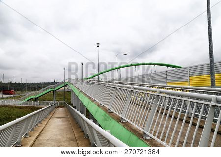 Elevated Pedestrian Crossing From The Inside. Safe Passage Across The Road