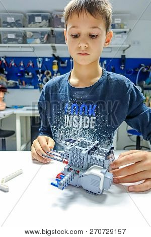 Vilnius, Lithuania - November 23, 2018: Kid Making Lego Robot Mindstorms. Robotic, Learning, Technol