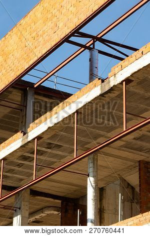 The Old Abandoned Unfinished Building Is Empty And Left To Collapse Over Time