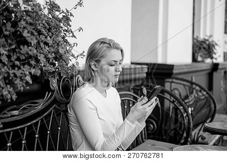 Keep In Touch. Woman Calm Face Texting Smartphone Cafe Terrace Urban Background. Lady Texting Messag