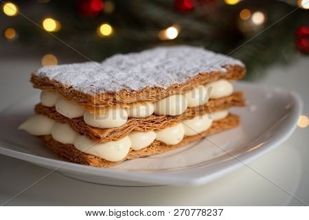 Classic Milfey Cake With Cream In The Bowl