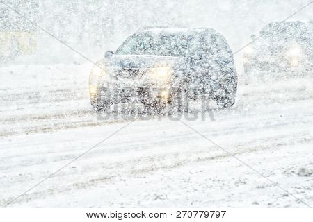 Car Rides Through A Snowstorm. Limited Vision On The Road. Blizzard - Car Traffic In Bad Weather Con