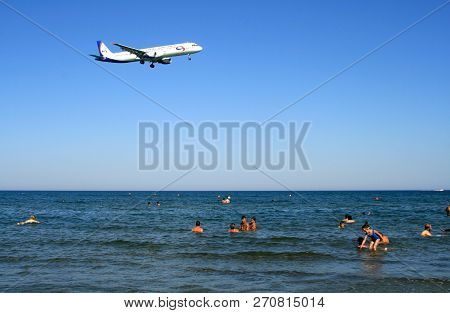 Larnaca, Cyprus, June 25th, 2017: An Airplane Passing Over The Mackenzie Beach To Approach Larnaca I