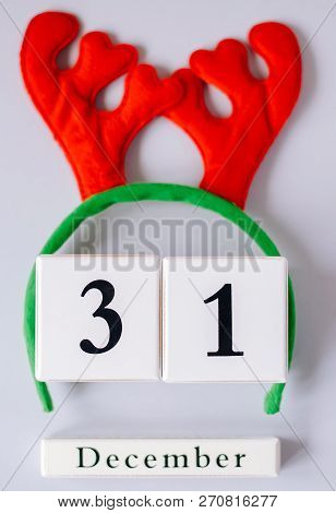 The Calendar With The Date Of The New Year Is December 31 And The Elegant Horns Of A Deer.