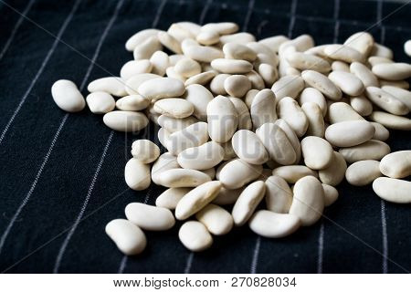 Canellini Navy White Beans On Black Cloth