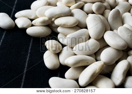 Canellini Navy White Beans On Black Cloth