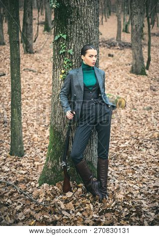 Woman Hunter. Hunting Season. Hunter Hunting. Hunting In Autumn Forest