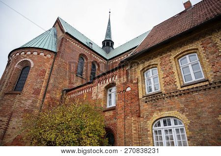 Ratzeburg Dom, Rear View Of The Cathedral In Typical Brick Romanesque Architecture In Northern Germa