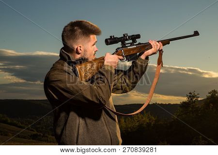 Hunting Gear - Hunting Supplies And Equipment. Hunter With Shotgun Gun On Hunt. Hunter With Powerful